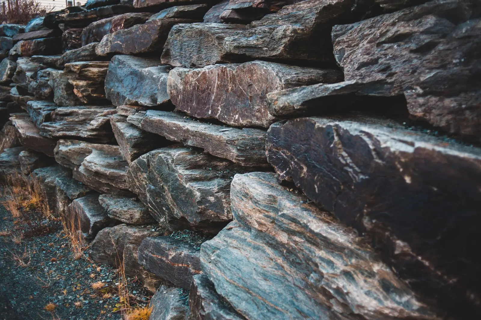 Close-up of stacked rough split stone